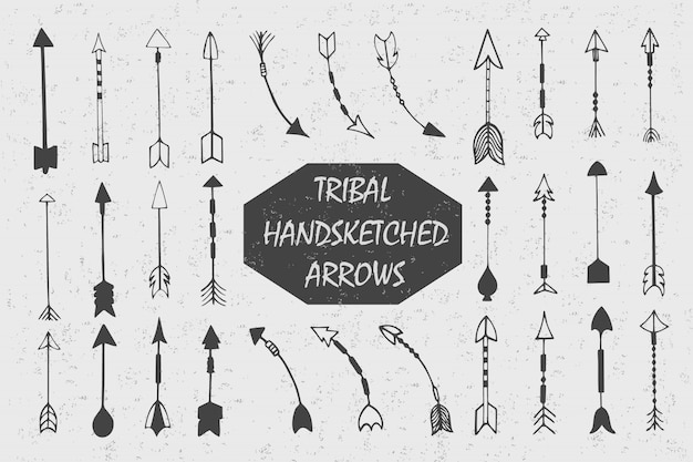 Mão desenhada com tinta tribal vintage conjunto com flechas. ilustração étnica, símbolo tradicional de índios americanos. Vetor grátis