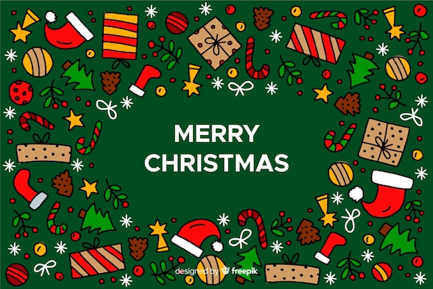 Mão desenhada fundo de natal com elementos de natal Vetor grátis