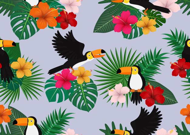Padrão sem emenda de floral tropical com folhas e pássaro tucano Vetor Premium