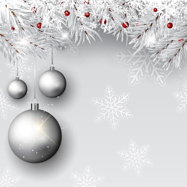 Palline di natale su rami d'argento Vettore gratuito