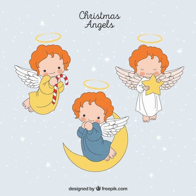 Foto Angeli Di Natale.Set Di Angeli Di Natale Disegnati A Mano Vettore Gratis