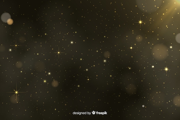 Sfondo di particelle d'oro bokeh Vettore gratuito