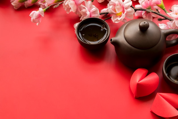 Chinese nieuwe jaarsamenstelling met thee Gratis Foto
