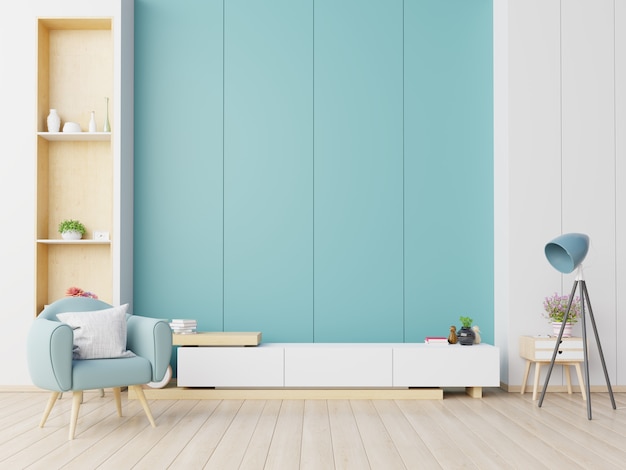 Kabinet tv in moderne woonkamer met fauteuil op blauwe muur. Premium Foto