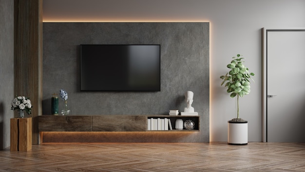 tv muur gemonteerd in een donkere kamer met betonnen muur 3d rendering gratis foto
