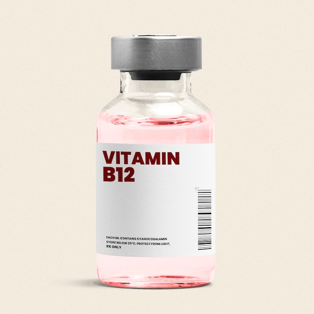 Rang taal vieren Vitamine b12-injectie in een glazen fles met roze vloeistof | Gratis Foto