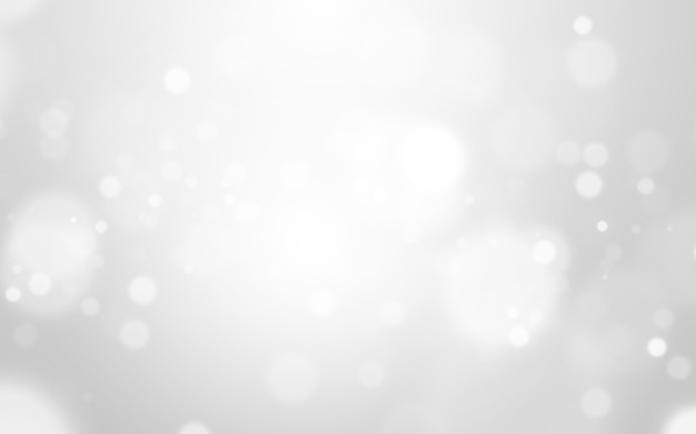Zilveren lichte en witte kerstmisachtergrond met onduidelijk beeld bokeh mooie textuur. glow schittering Premium Foto