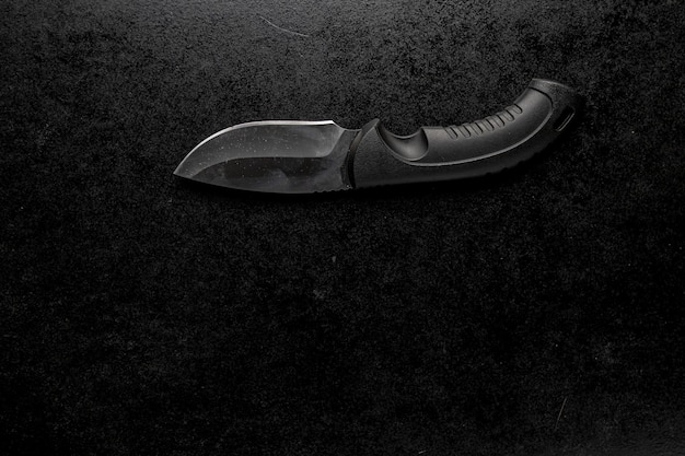 scherp mesje met zwart handvat | Foto