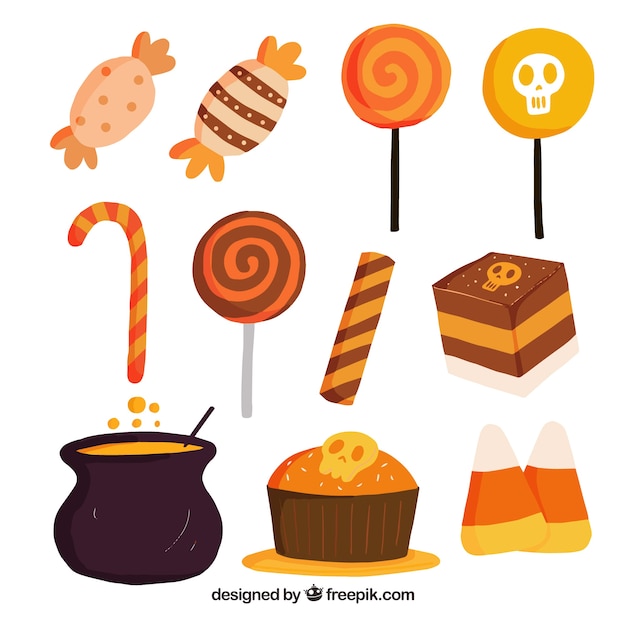 Assortiment van halloween snoep en cake | Gratis Vector