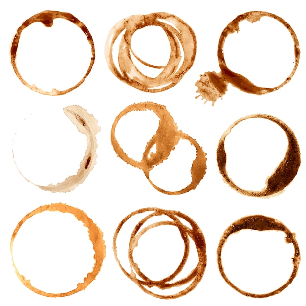Coffe vlekken en spatten, vuile bruine cup ringen vector set Premium Vector