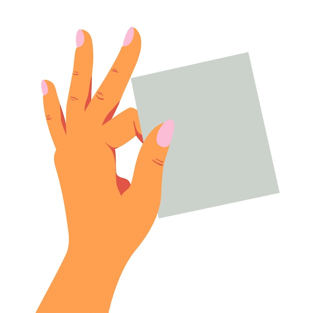 De vrouwelijke hand houdt speels een leeg blad van notadocument met twee vingers. Premium Vector