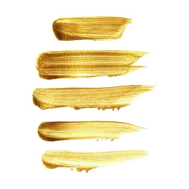 Gouden penseelstreek handgeschilderde set geïsoleerd op een witte achtergrond Premium Vector