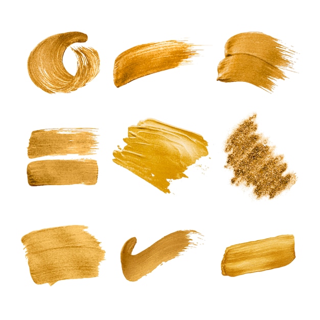 Gouden penseelstreken collectie Gratis Vector