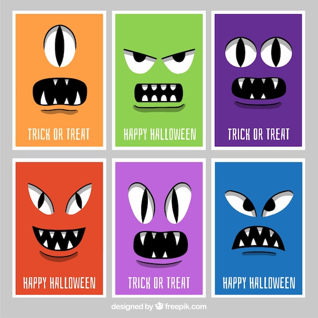 Halloween kaarten met monster gezichten | Gratis Vector