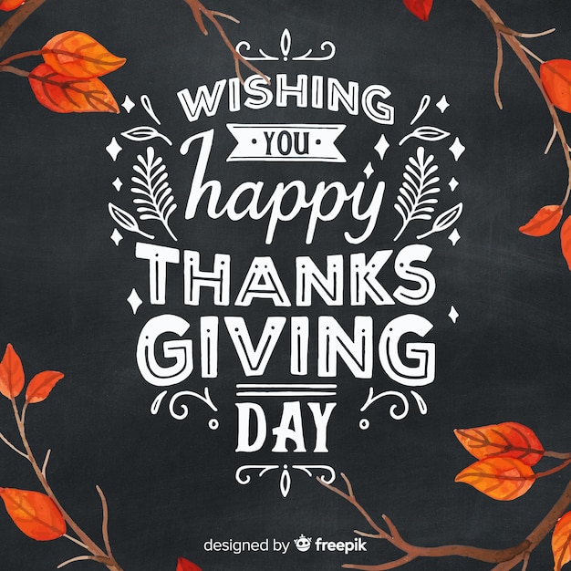 Hand getrokken thanksgiving achtergrond met herfst belettering Gratis Vector