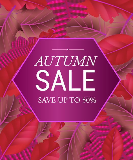 Herfstverkoop bespaar tot vijftig procent belettering in zeshoek. creatieve belettering in kader Gratis Vector