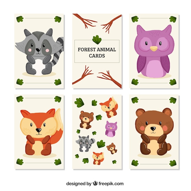 Download Kaarten pak van hand getrokken kleine dieren in het bos | Gratis Vector