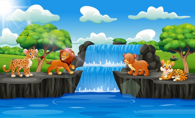Leuke dieren met watervallandschap Premium Vector