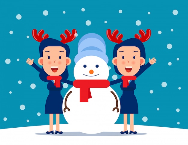 Leuke persoon en een sneeuwpop. winter seizoen concept Premium Vector