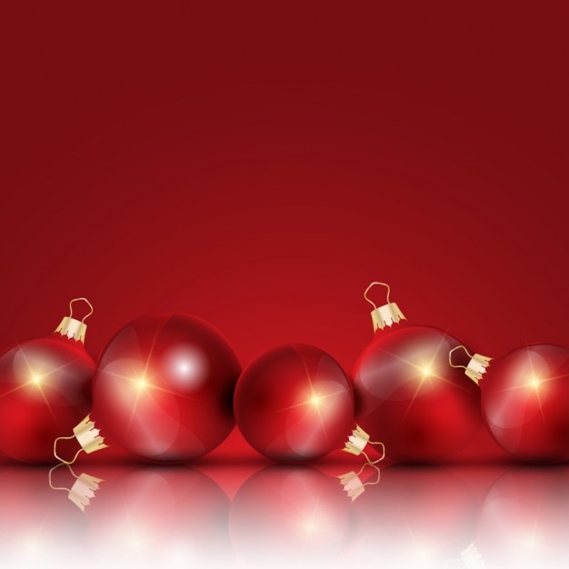 Rode kerst achtergrond met kerstballen | Gratis Vector