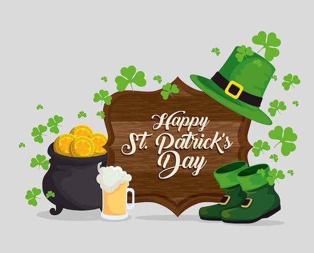 St patrick's day-viering met houten embleem en klavers Gratis Vector
